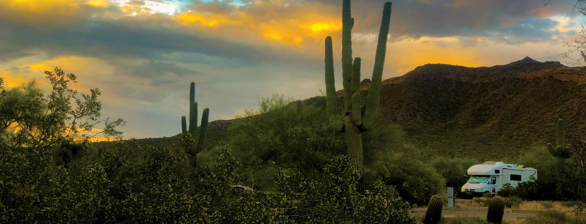 RV in the Arizona dessert with sunset